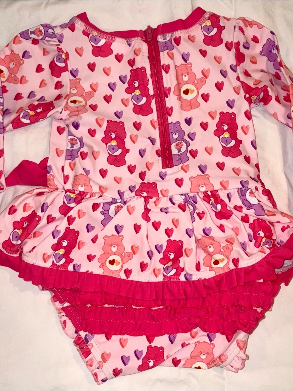 Ruffle Butts X Care Bears long sleeve 1 piece swimsuit/rashguard sz 12-18 mo NWT
